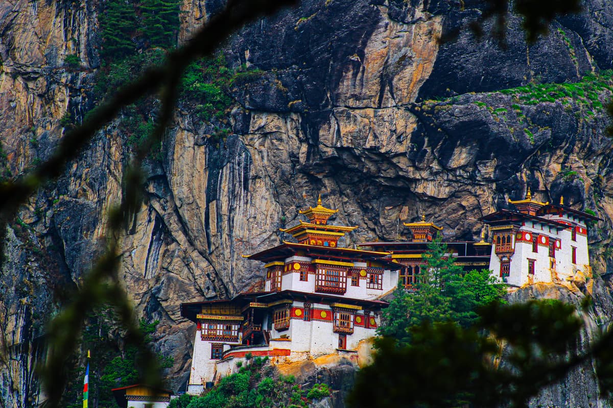 Haa Valley Bhutan – Traditional Farmhouse with Himalayan Mountains in Background